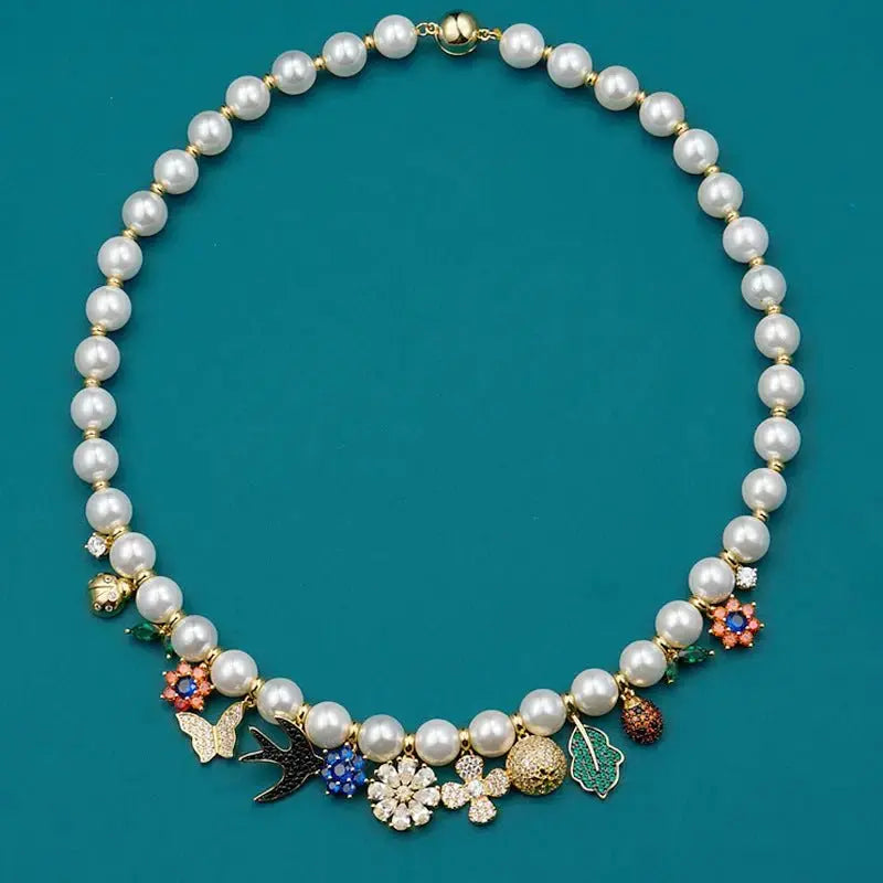 Fashionable retro style jewelry garden necklace women's jewelry flower pendant swallow beetle buckle pearl collarbone chain - FluxDigital