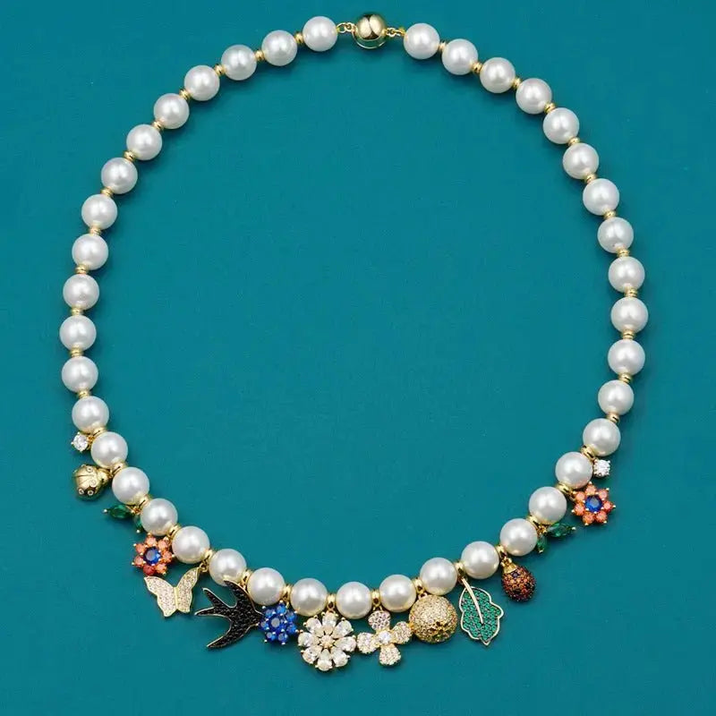 Fashionable retro style jewelry garden necklace women's jewelry flower pendant swallow beetle buckle pearl collarbone chain - FluxDigital